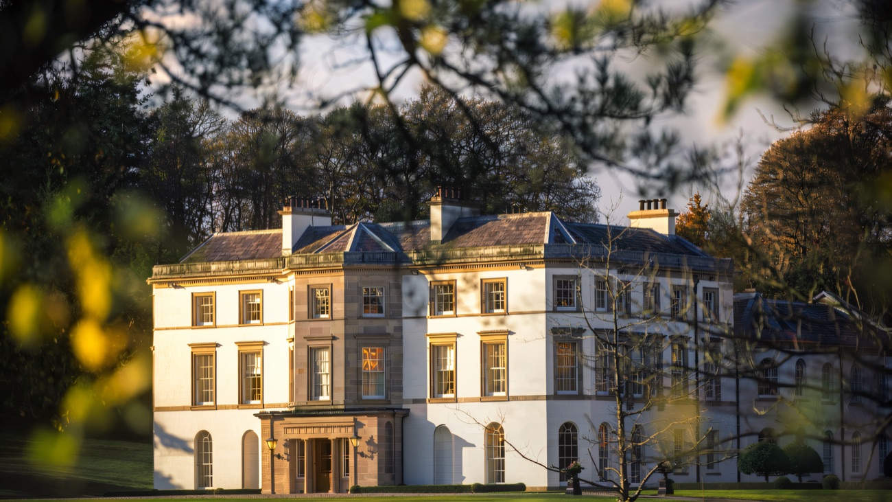 The Montalto Mansion front, framed by autumn foliage