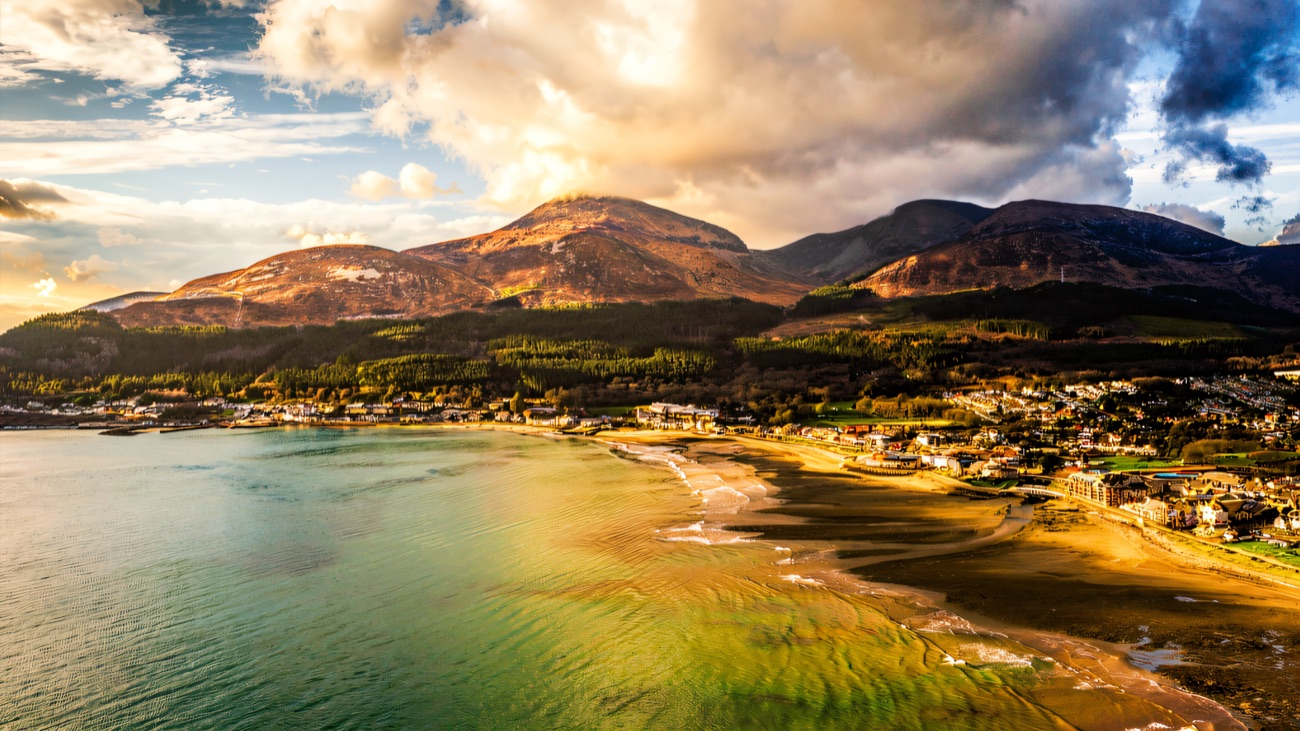 Slieve Donard and the Mournes sweep down to the sea at Newcastle