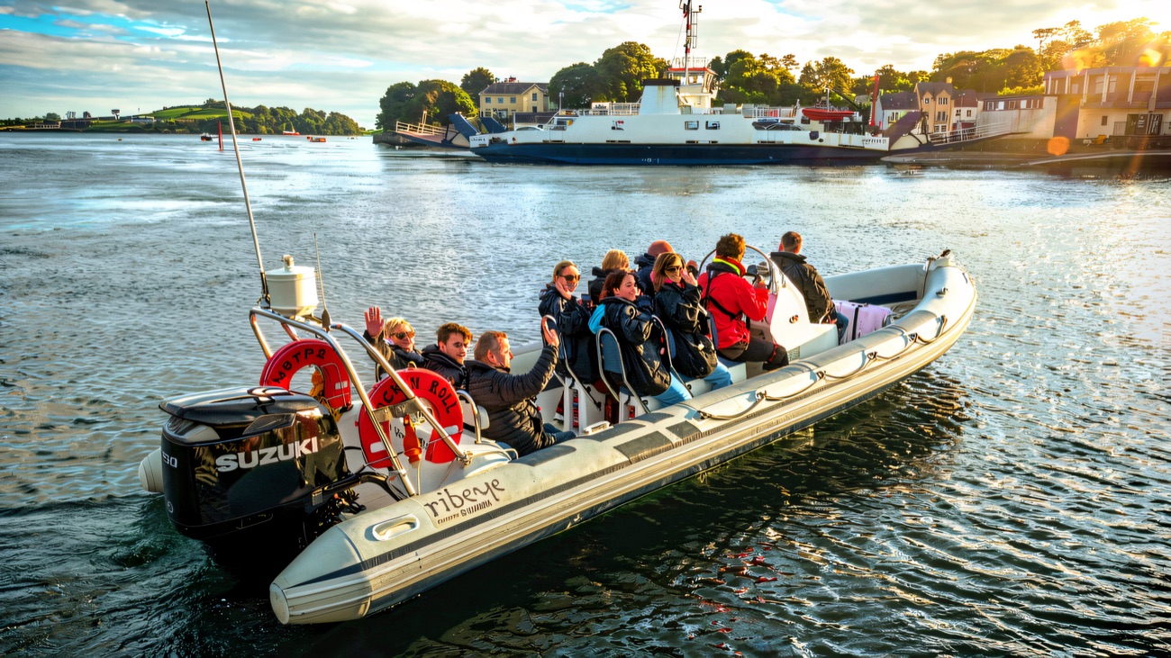 The safari RIB glides through the Narrows as the Strangford-Portaferry car ferry crosses behind