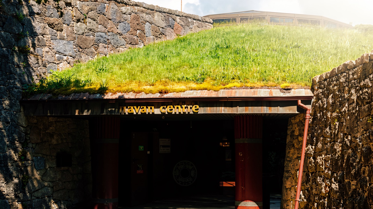 The grass-roofed visitor centre, tucked into the hillside.