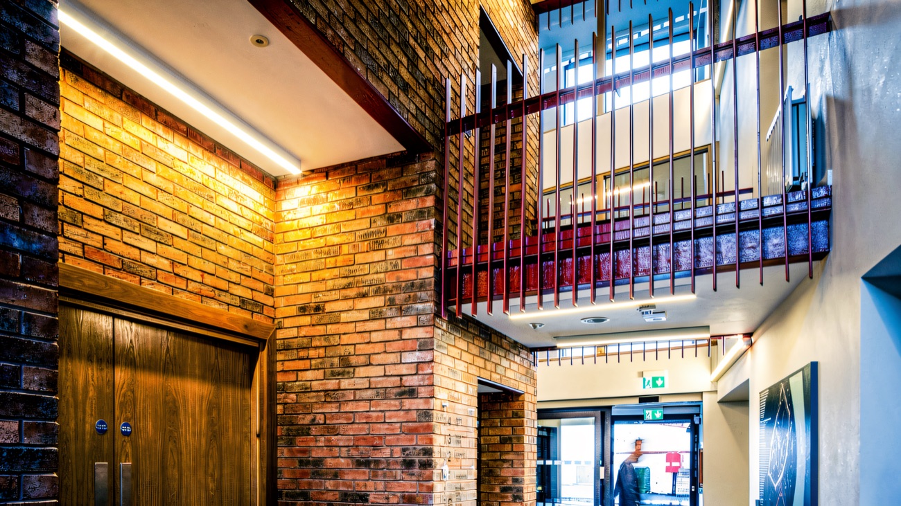The brick-and-timber lobby atrium