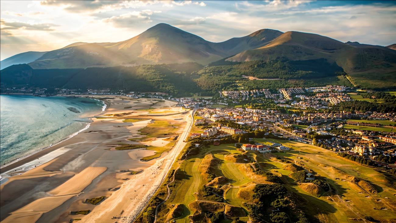 The whole sweep of Newcastle beach and Dundrum Bay under the Mournes