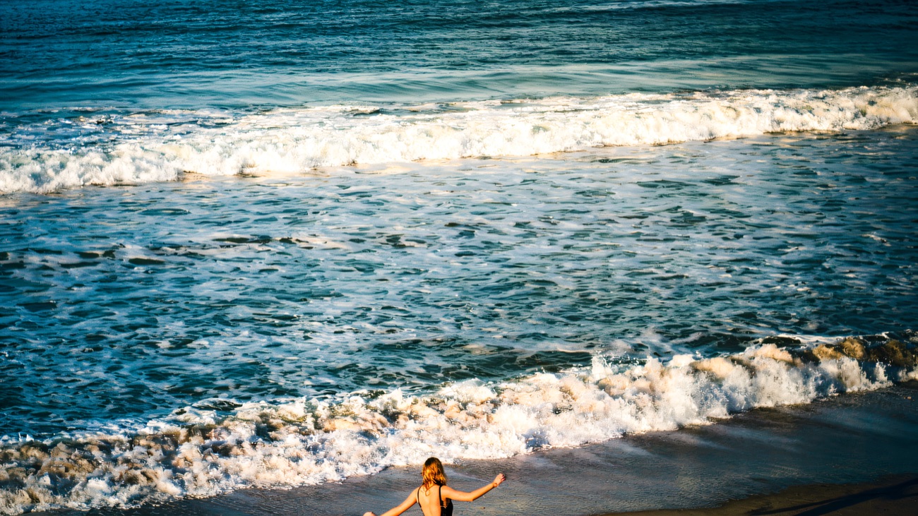 Wading out into the sea for a cold dip