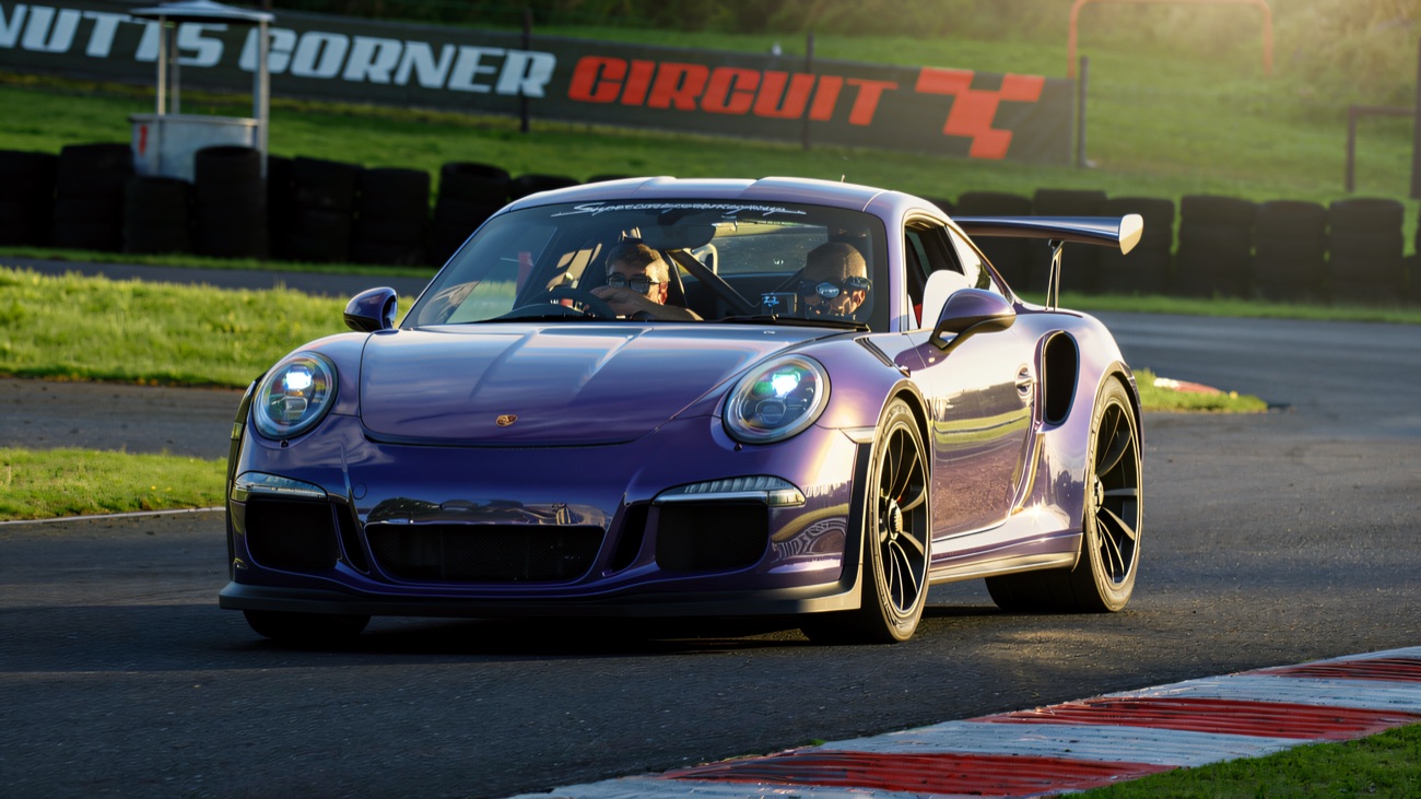 A track-day sports car powering round the circuit at Nutts Corner