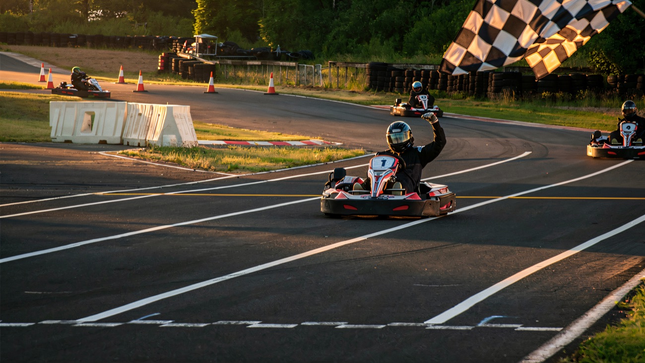 Taking the chequered flag on the outdoor kart track at Nutts Corner
