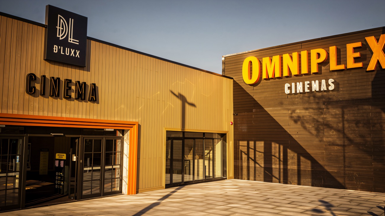 The cinema entrance with its Omniplex Cinemas and D'LUXX signage