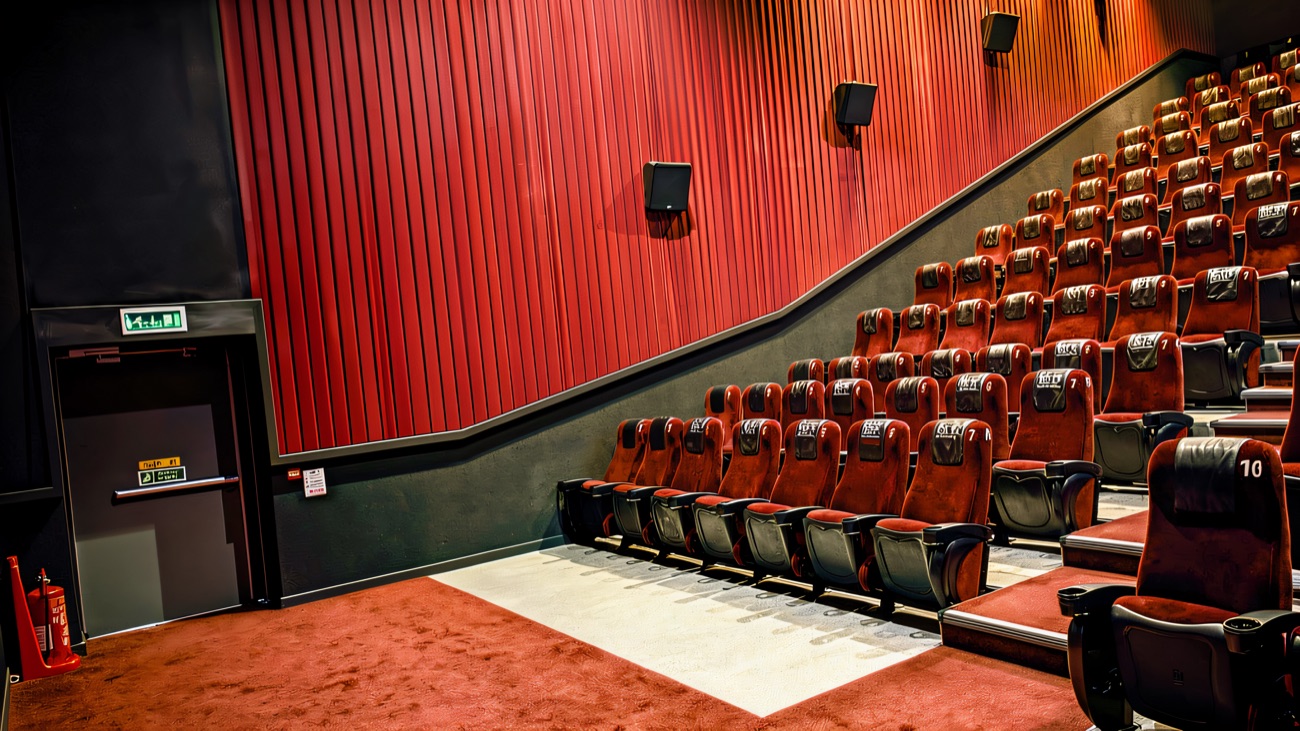 Red seats inside one of the screens