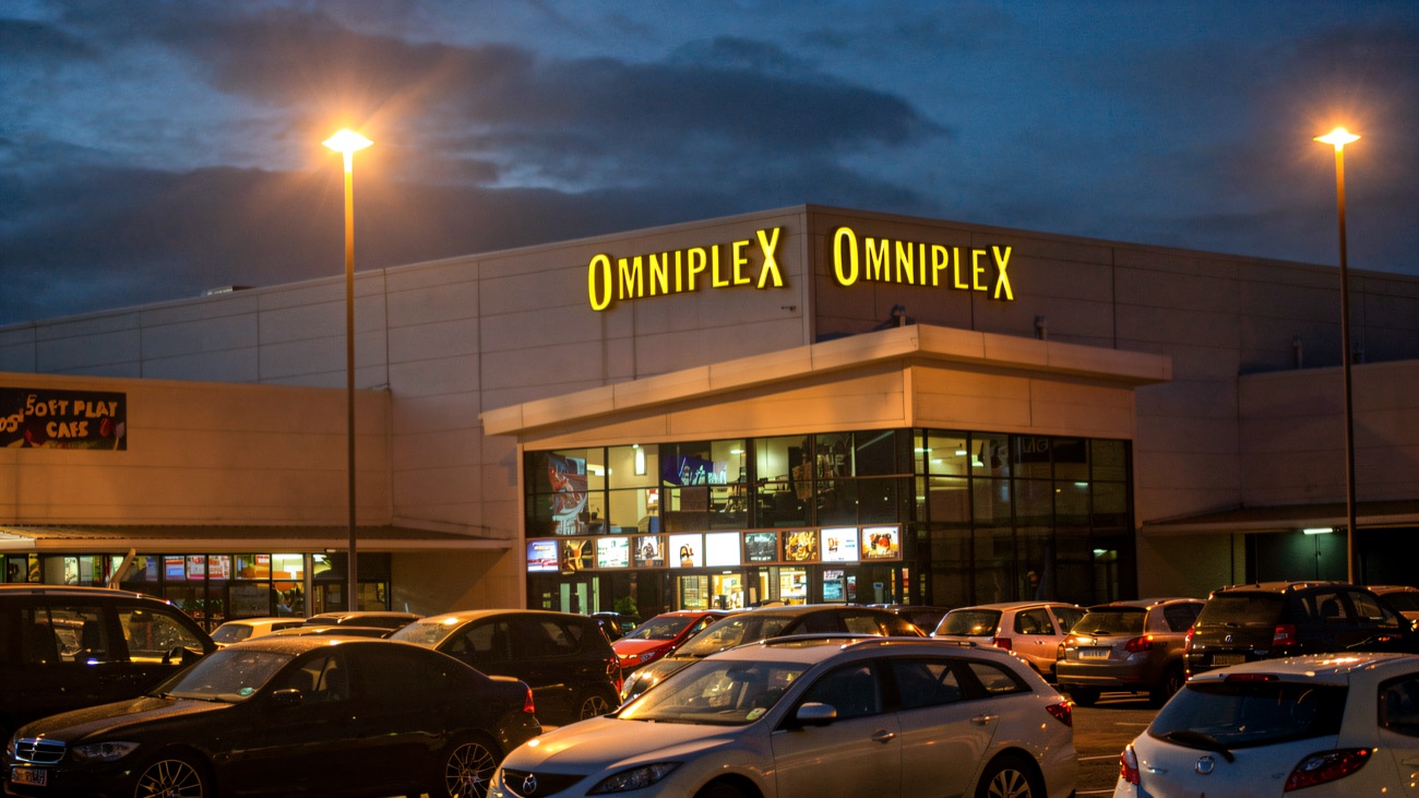 The Omniplex lit up at dusk