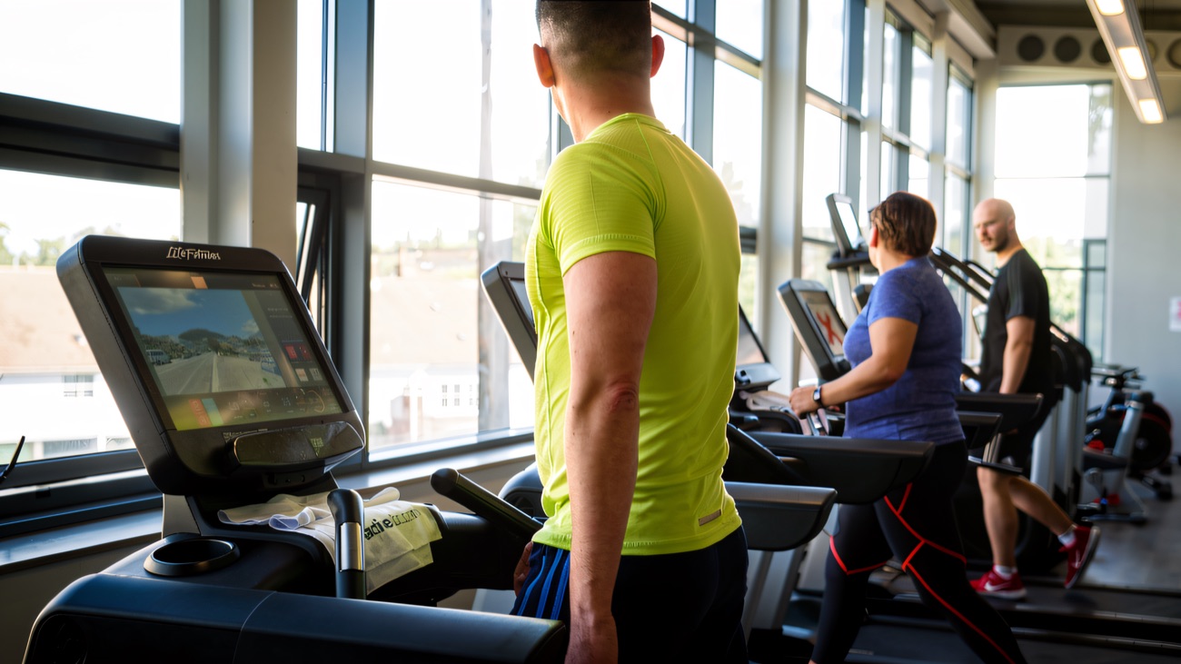 The gym, with treadmills lined up along the windows