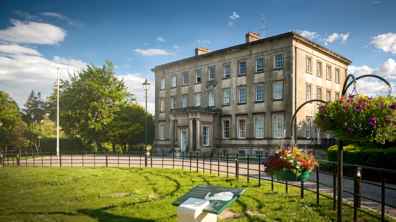 The grand stone Archbishop's Palace across the demesne lawns