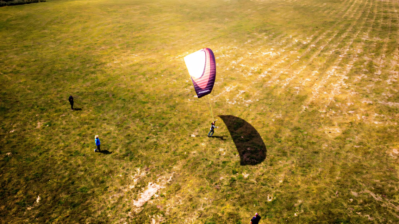 Ground-handling practice in a big green field, seen from above