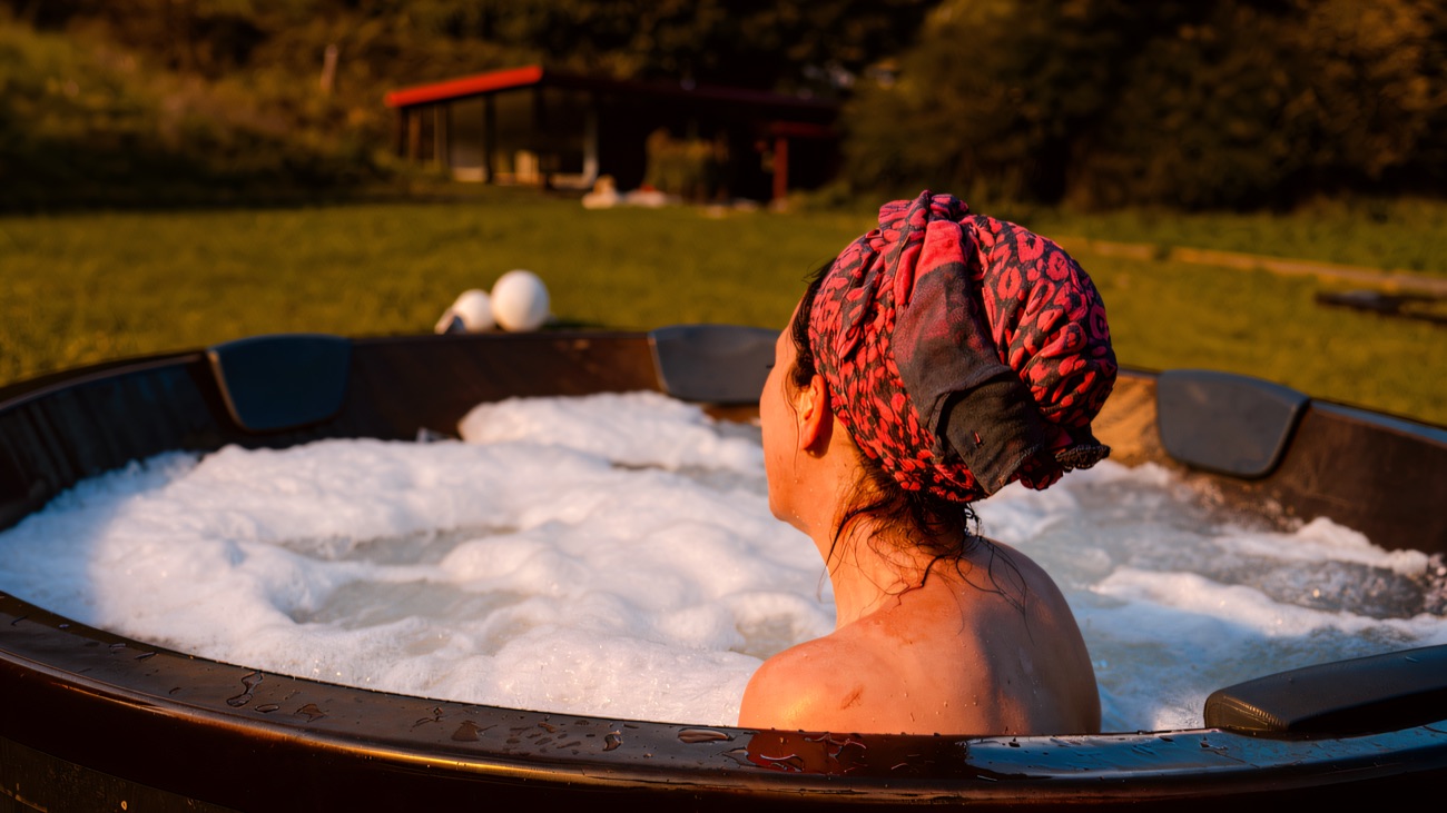 Soaking in the hot tub looking out to the hillside