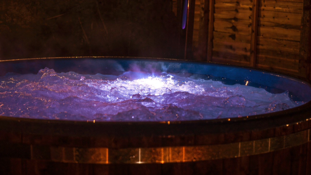 The hot tub lit up in the evening