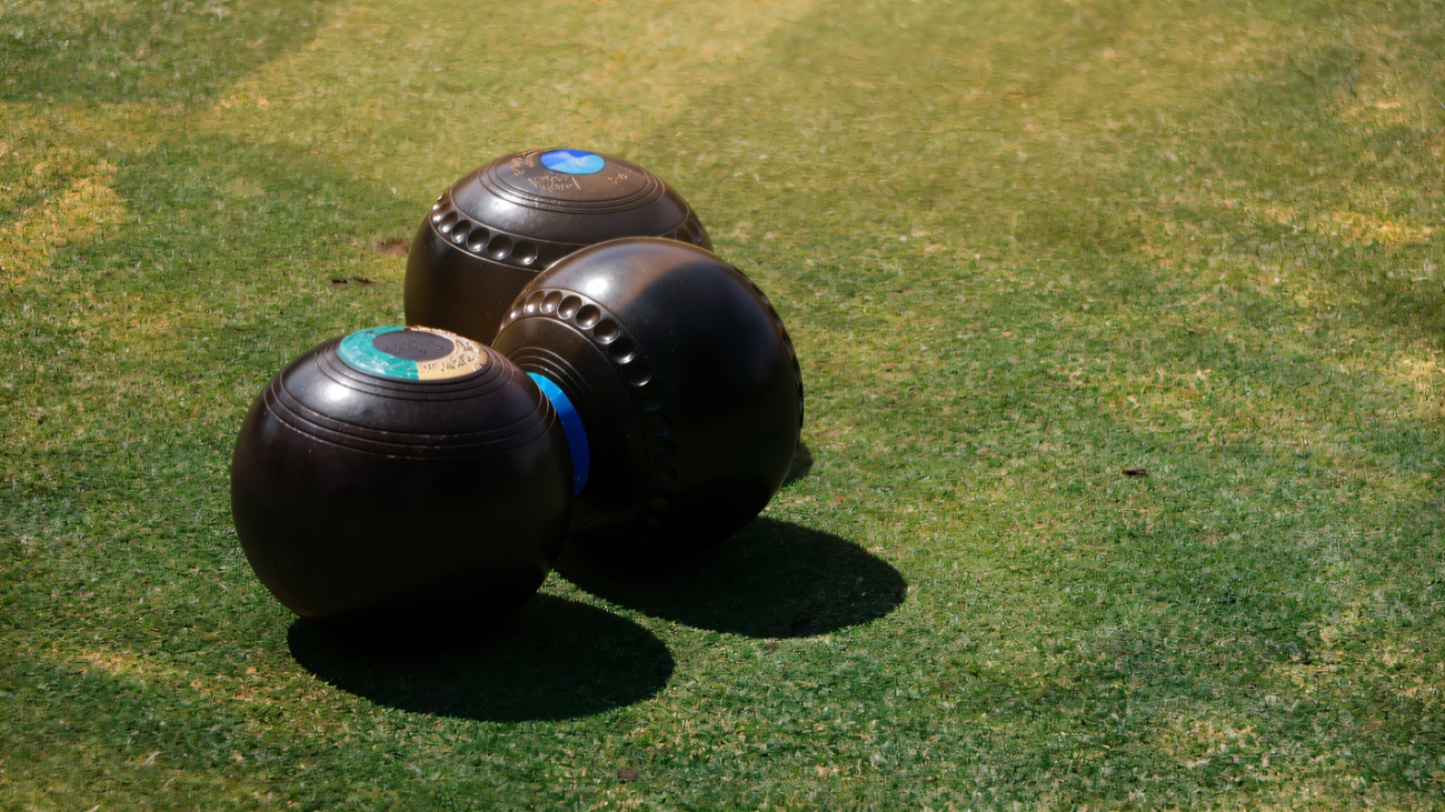 Bowls resting on the green outside
