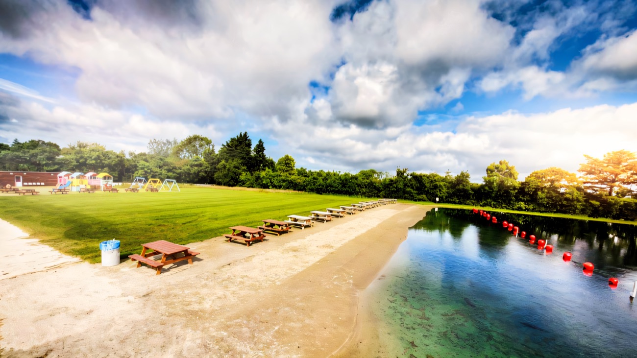 The inland white-sand beach and clear water at Rosepark Farm