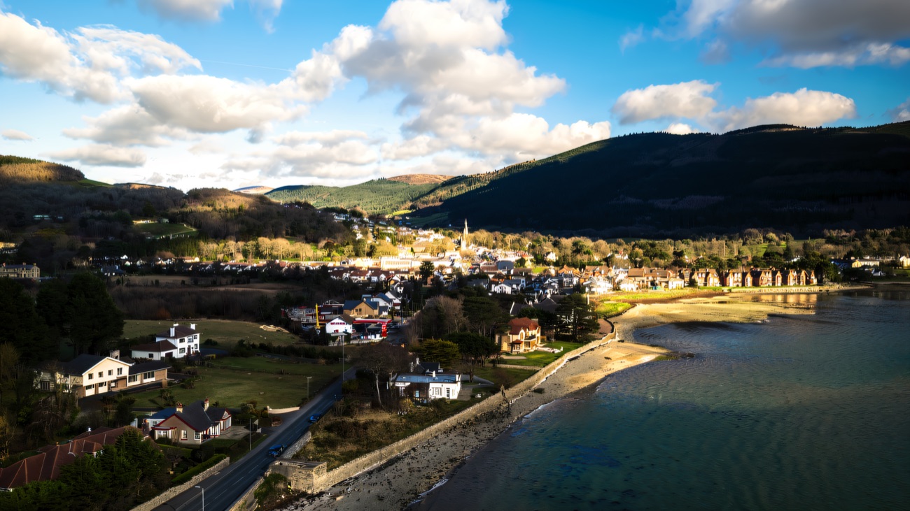 The shoreline village of Rostrevor curving along the lough