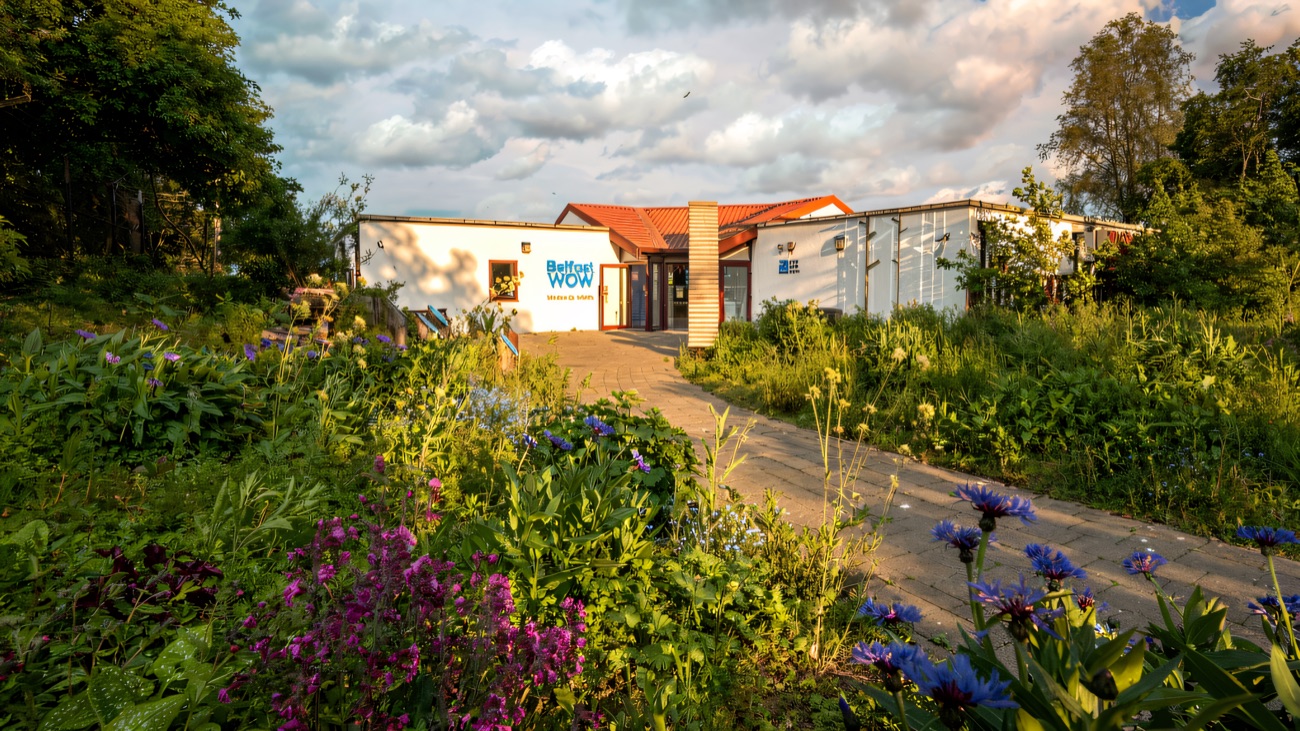 The visitor centre sits behind a meadow of wildflowers by the lagoon.
