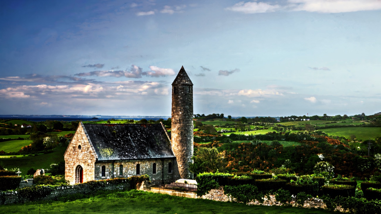 The memorial church and round tower at Saul, said to mark where St Patrick founded his first church.