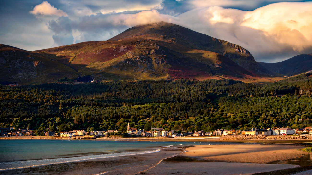 The Newcastle shoreline with Slieve Donard rising behind the beach