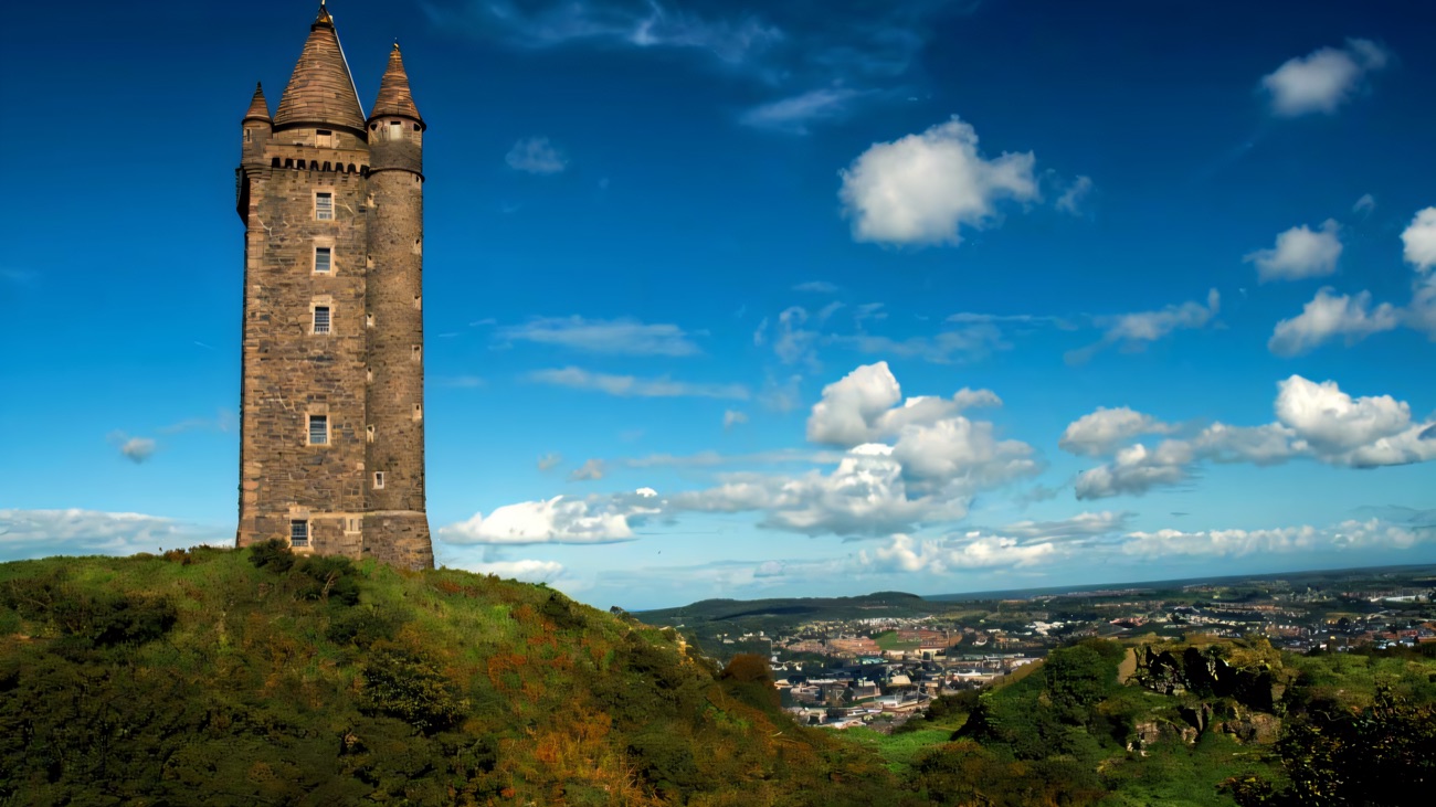 Scrabo Tower on its hilltop with the town and Strangford Lough view stretching away below