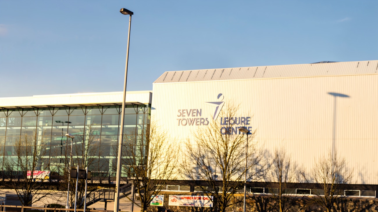 The Seven Towers Leisure Centre building and its name sign seen from the road