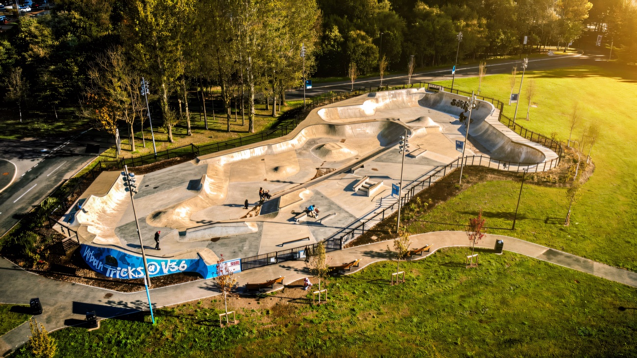 Aerial view of the concrete park with its painted Urban Tricks @ V36 wall