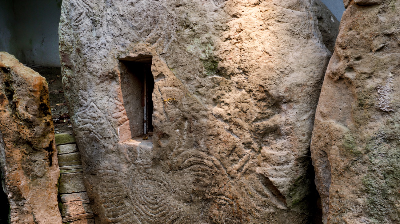 A single carved orthostat close up, its ancient markings still clear.