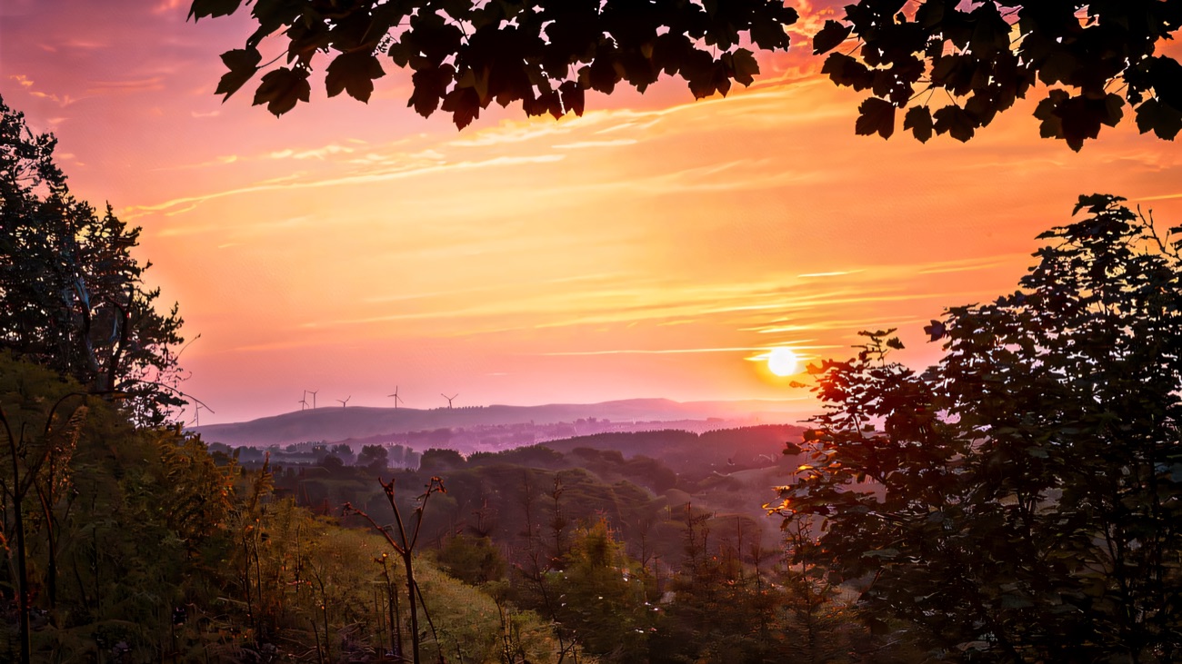 Sunset over the Clogher Valley from the top of Knockmany hill.