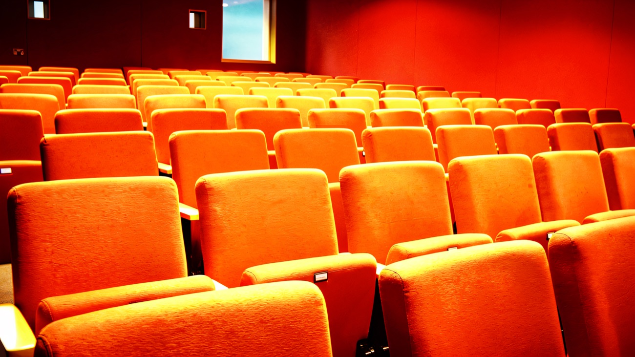 The red-seated auditorium inside the centre