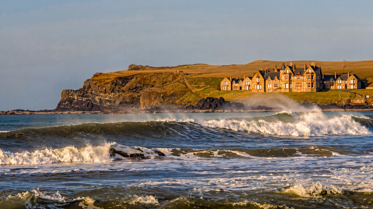 Big Atlantic swell rolling into the bay below the headland