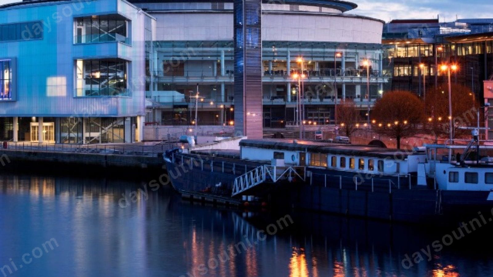 The Belfast Barge moored on the River Lagan
