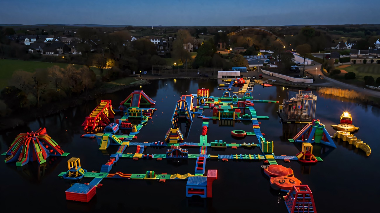 Aerial view of the whole floating aqua park across the lake