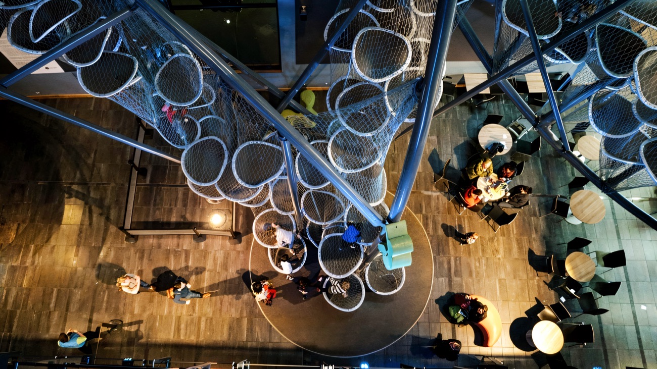 Looking down through the steel mesh tubes of the Climbit climbing sculpture at W5
