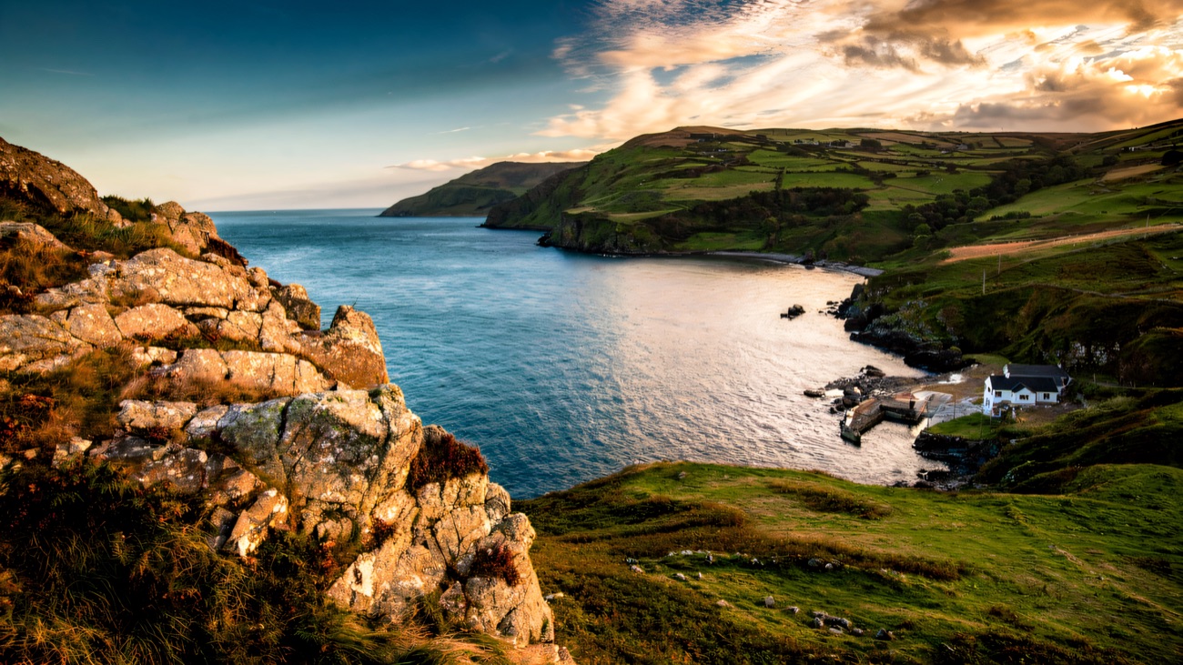 Golden evening light over the little harbour and cove
