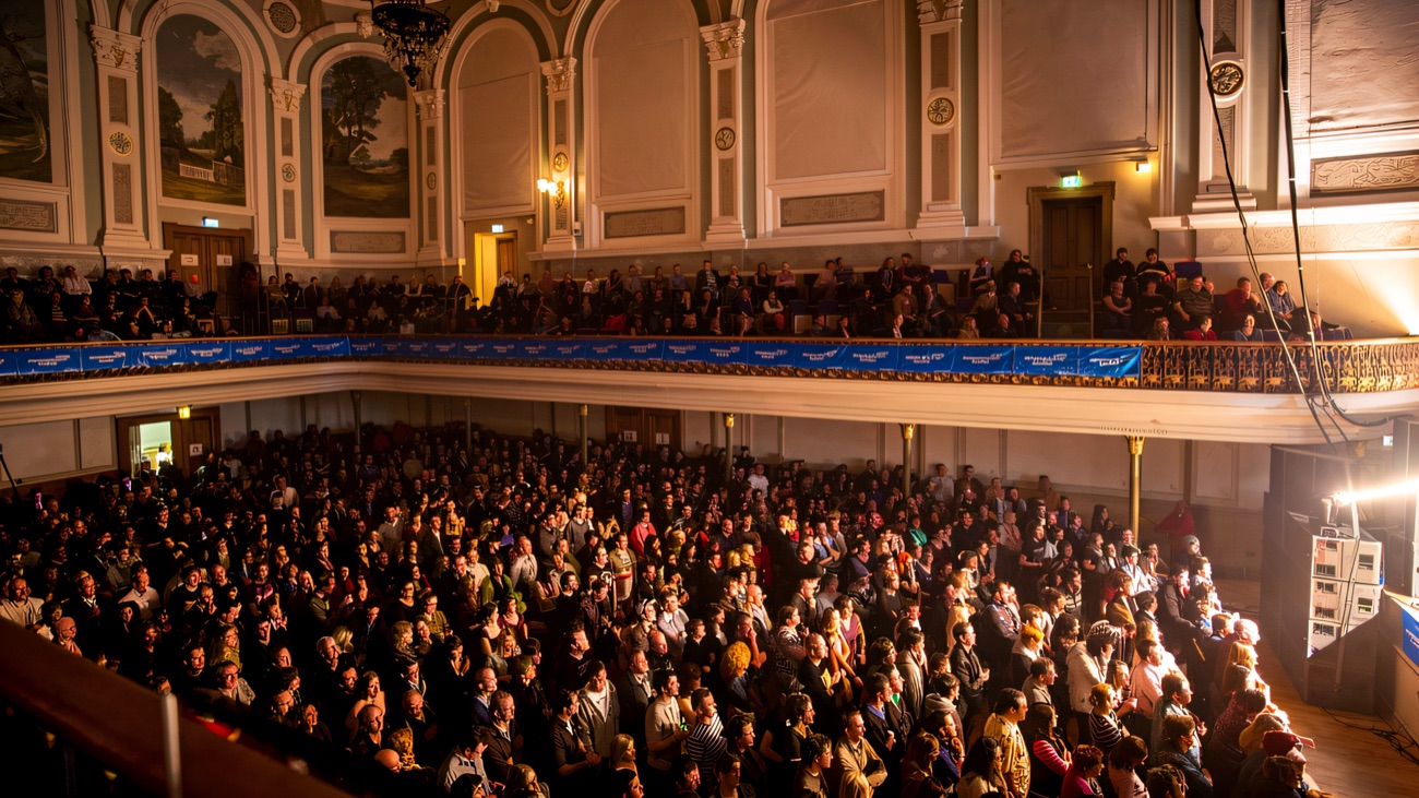 A packed house enjoying a gig in the historic hall