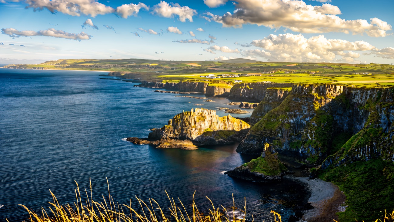 The dramatic Causeway Coast cliffs the Way follows in the north