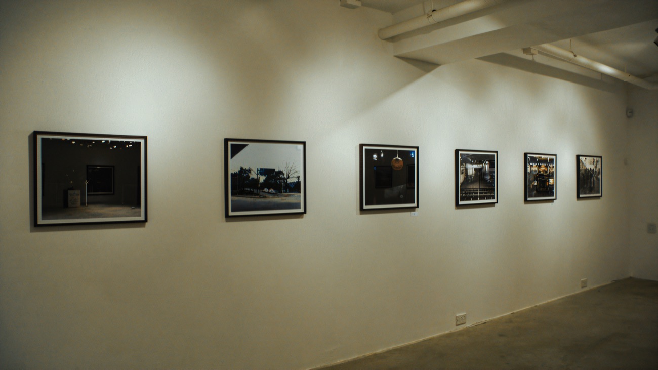 A black-and-white photography exhibition on the gallery walls