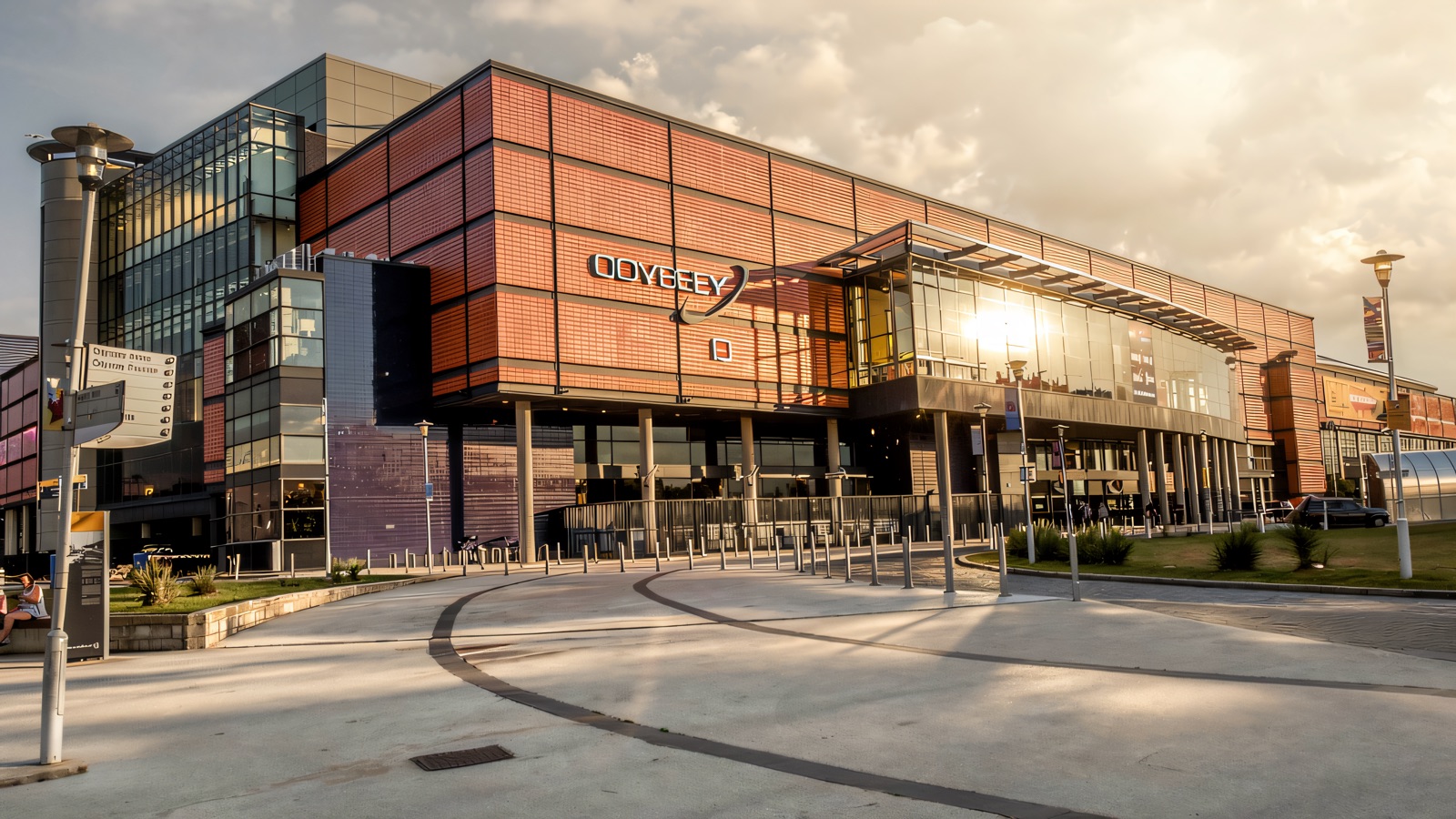 The exterior of the Odyssey complex in Belfast, home to W5, with its orange and dark cladding and ODYSSEY signage