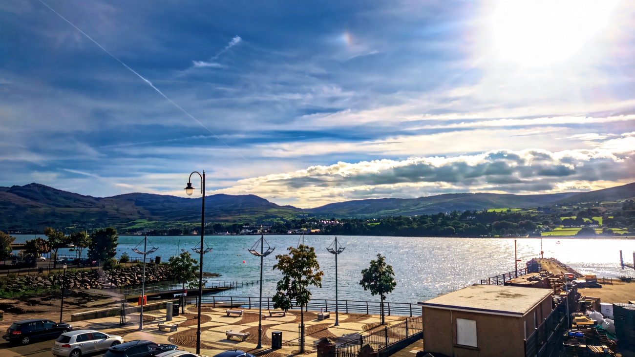The tiled waterfront square looking across to the mountains