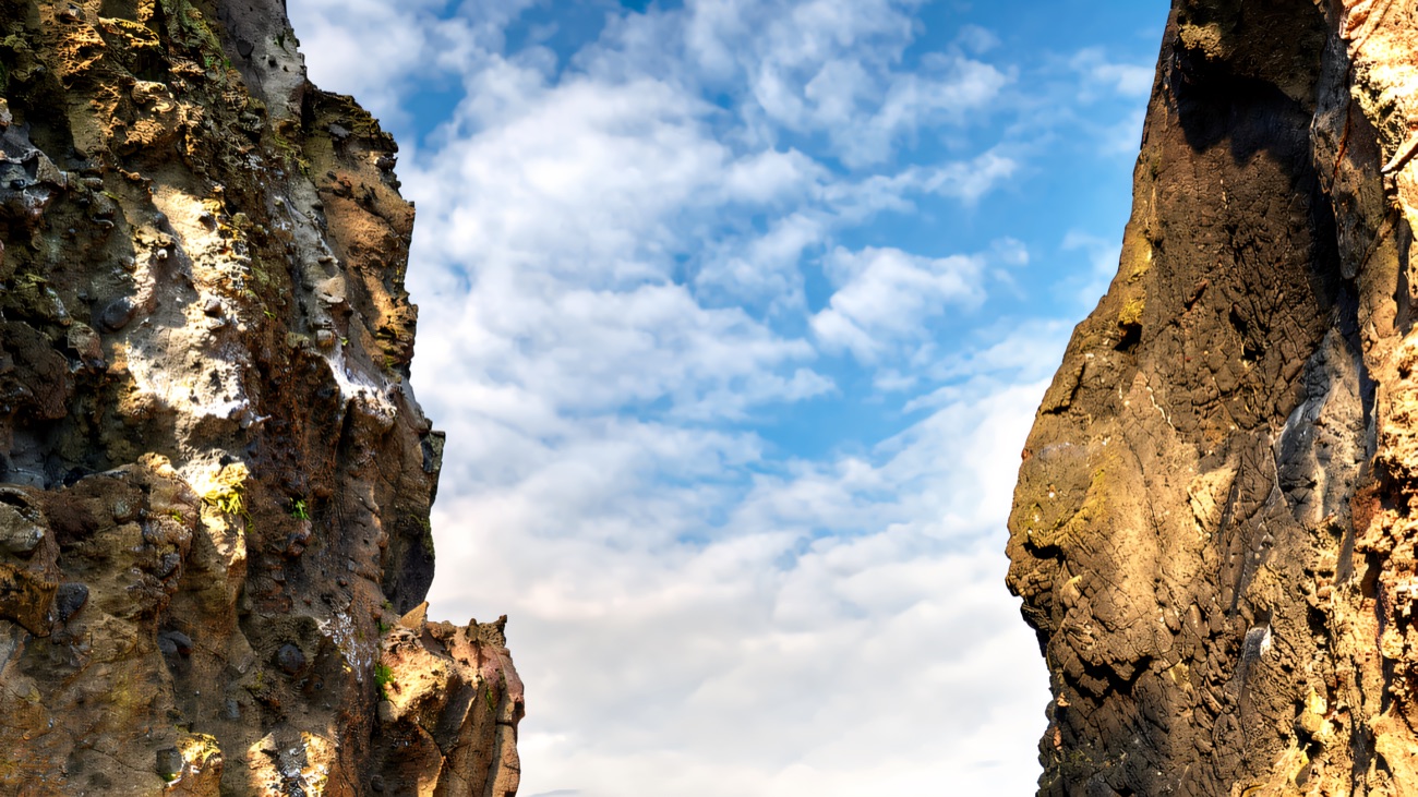 Kayaks slipping beneath the Carrick-a-Rede rope bridge